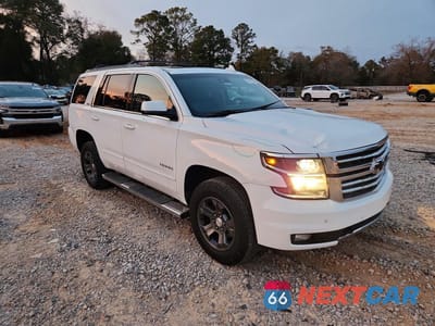 Czwarte zdjęcie samochodu z boku: 2016 CHEVROLET TAHOE K1500 LT VIN:1GNSKBKC0GR225361 - miniatura