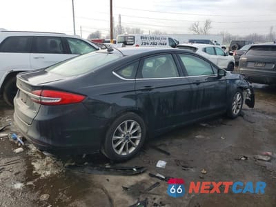 Trzecie zdjęcie samochodu z tyłu: 2017 FORD FUSION SE VIN:3FA6P0H72HR375218 - miniatura