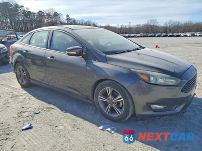 Czwarte zdjęcie samochodu z boku: 2017 FORD FOCUS SE VIN:1FADP3FE9HL269504 - miniatura