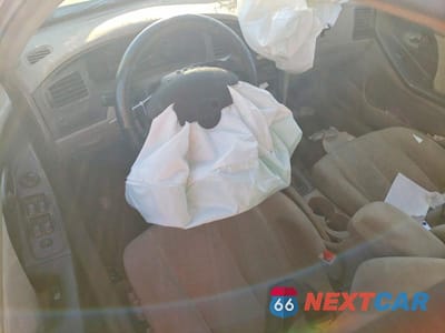 Zdjęcie 8 z 11 samochodu: 2002 HYUNDAI ELANTRA VIN:KMHDN45D12U440826 - miniatura