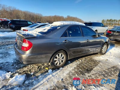 Trzecie zdjęcie samochodu z tyłu: 2003 TOYOTA CAMRY LE VIN:4T1BE30K73U672322 - miniatura