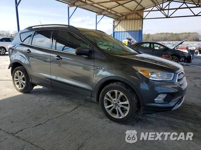 Czwarte zdjęcie samochodu z boku: 2018 FORD ESCAPE SE VIN:1FMCU0GD4JUD33754 - miniatura
