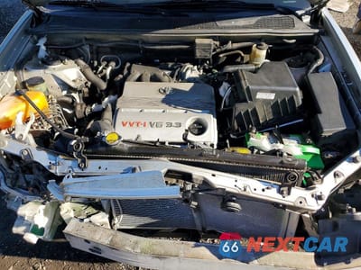 Zdjęcie 12 z 13 samochodu: 2005 TOYOTA HIGHLANDER LIMITED VIN:JTEEP21AX50120055 - miniatura