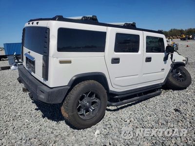 Trzecie zdjęcie samochodu z tyłu: 2003 HUMMER H2 VIN:5GRGN23U53H127504 - miniatura