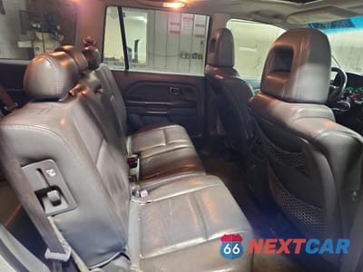 Zdjęcie 11 z 13 samochodu: 2005 HONDA PILOT EXL VIN:2HKYF185X5H515864 - miniatura