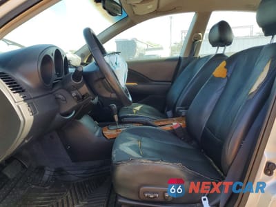 Zdjęcie 7 z 13 samochodu: 2002 NISSAN ALTIMA BASE VIN:1N4AL11D32C108526 - miniatura