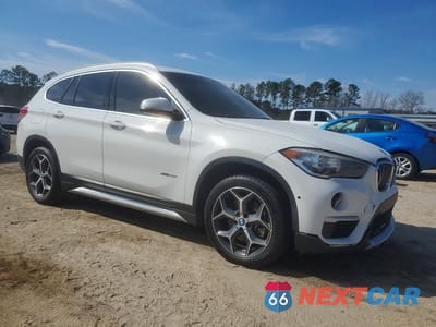 Czwarte zdjęcie samochodu z boku: 2018 BMW X1 XDRIVE28I VIN:WBXHT3C35J5K25300 - miniatura