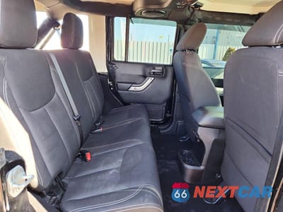Zdjęcie 11 z 13 samochodu: 2013 JEEP WRANGLER UNLIMITED SAHARA VIN:1C4BJWEG1DL519464 - miniatura
