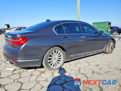 Trzecie zdjęcie samochodu z tyłu: 2016 BMW 740 I VIN:WBA7E2C54GG546723 - miniatura