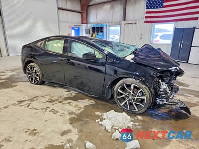Czwarte zdjęcie samochodu z boku: 2023 TOYOTA PRIUS PRIME XSE PREMIUM VIN:JTDACACU9P3009417 - miniatura