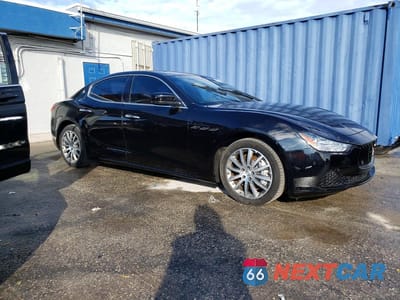 Czwarte zdjęcie samochodu z boku: 2014 MASERATI GHIBLI VIN:ZAM57XSAXE1128131 - miniatura