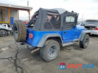 Trzecie zdjęcie samochodu z tyłu: 1999 JEEP WRANGLER / TJ SE VIN:1J4FY29P2XP481430 - miniatura