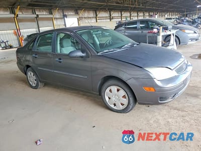 Czwarte zdjęcie samochodu z boku: 2006 FORD FOCUS ZX4 VIN:1FAFP34N96W250491 - miniatura