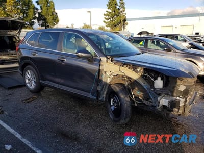 Czwarte zdjęcie samochodu z boku: 2025 HONDA CR-V EXL VIN:2HKRS3H72SH335402 - miniatura