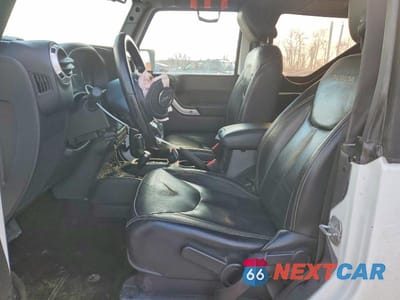 Zdjęcie 7 z 12 samochodu: 2016 JEEP WRANGLER SAHARA VIN:1C4AJWBGXGL145828 - miniatura