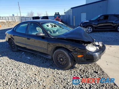 Czwarte zdjęcie samochodu z boku: 1999 FORD TAURUS SE VIN:1FAFP53UXXG229925 - miniatura