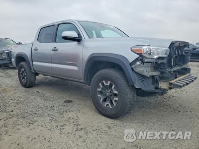Czwarte zdjęcie samochodu z boku: 2022 TOYOTA TACOMA TRD OFF ROAD VIN:3TMCZ5AN5NM475674 - miniatura