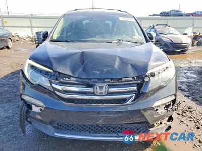 Piąte zdjęcie samochodu w środku: 2017 HONDA PILOT ELITE VIN:5FNYF6H01HB013460 - miniatura
