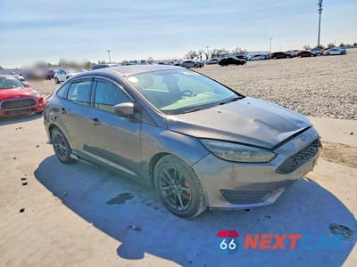 Czwarte zdjęcie samochodu z boku: 2017 FORD FOCUS SE VIN:1FADP3F22HL338264 - miniatura