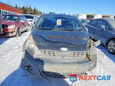 Piąte zdjęcie samochodu w środku: 2013 KIA RIO LX VIN:KNADM5A32D6853012 - miniatura