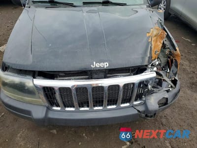 Zdjęcie 12 z 13 samochodu: 2003 JEEP GRAND CHEROKEE LAREDO VIN:1J4GW48S53C563004 - miniatura