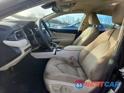 Zdjęcie 7 z 13 samochodu: 2020 TOYOTA CAMRY HYBRID LE VIN:4T1L31AKXLU526509 - miniatura