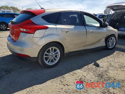 Trzecie zdjęcie samochodu z tyłu: 2017 FORD FOCUS SE VIN:1FADP3K23HL338764 - miniatura