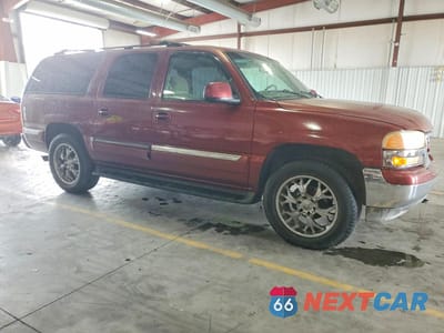 Czwarte zdjęcie samochodu z boku: 2002 GMC YUKON XL C1500 VIN:1GKEC16Z82J107601 - miniatura