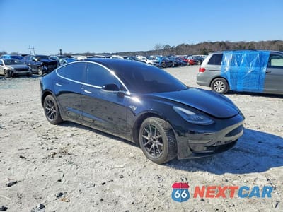 Czwarte zdjęcie samochodu z boku: 2018 TESLA MODEL 3 VIN:5YJ3E1EA6JF027308 - miniatura
