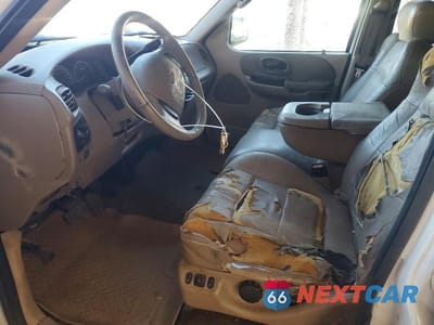 Zdjęcie 7 z 12 samochodu: 2002 FORD F150 SUPERCREW VIN:1FTRW07L42KC51665 - miniatura