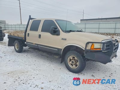 Czwarte zdjęcie samochodu z boku: 1999 FORD F250 SUPER DUTY VIN:1FTNW21S4XED03019 - miniatura