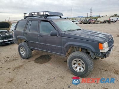 Czwarte zdjęcie samochodu z boku: 1995 JEEP GRAND CHEROKEE LIMITED VIN:1J4GZ78Y2SC674587 - miniatura