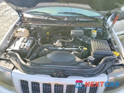 Zdjęcie 12 z 13 samochodu: 2004 JEEP GRAND CHEROKEE LAREDO VIN:1J4GW48S04C343903 - miniatura