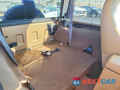 Zdjęcie 11 z 13 samochodu: 1999 JEEP WRANGLER / TJ SPORT VIN:1J4FY19S0XP407289 - miniatura