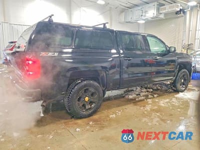 Trzecie zdjęcie samochodu z tyłu: 2017 CHEVROLET SILVERADO K1500 LT VIN:3GCUKREC2HG103270 - miniatura