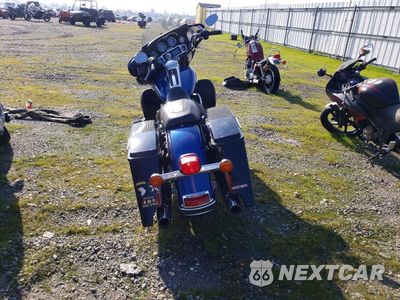 Czwarte zdjęcie samochodu z boku: 2010 HARLEY-DAVIDSON FLHTK VIN:1HD1KEM14AB670377 - miniatura