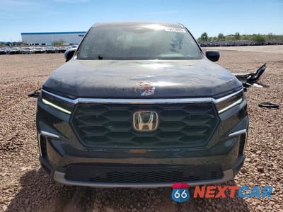 Piąte zdjęcie samochodu w środku: 2024 HONDA PILOT EXL VIN:5FNYG2H41RB003604 - miniatura
