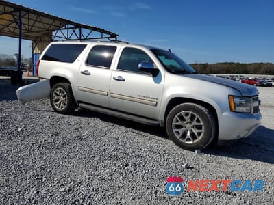 Czwarte zdjęcie samochodu z boku: 2014 CHEVROLET SUBURBAN C1500 LT VIN:1GNSCJE0XER192326 - miniatura