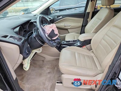 Zdjęcie 7 z 13 samochodu: 2014 FORD ESCAPE TITANIUM VIN:1FMCU0JX4EUD80212 - miniatura