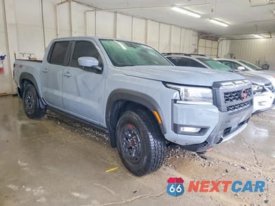 Czwarte zdjęcie samochodu z boku: 2026 NISSAN FRONTIER PRO-4X VIN:1N6ED1EK8TN610520 - miniatura