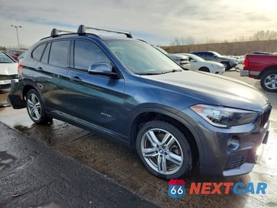 Czwarte zdjęcie samochodu z boku: 2018 BMW X1 XDRIVE28I VIN:WBXHT3C37J5F92959 - miniatura