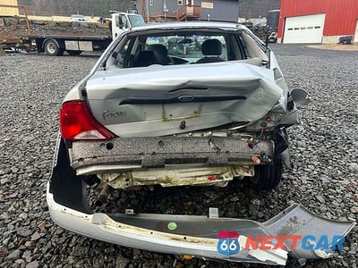 Zdjęcie 6 z 13 samochodu: 2001 FORD FOCUS LX VIN:1FAFP33P71W151227 - miniatura