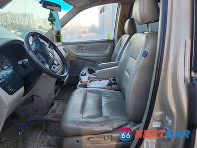 Zdjęcie 7 z 13 samochodu: 2002 HONDA ODYSSEY EXL VIN:2HKRL18002H560048 - miniatura