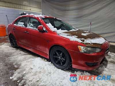 Czwarte zdjęcie samochodu z boku: 2011 MITSUBISHI LANCER VIN:JA32U2FUXBU029437 - miniatura