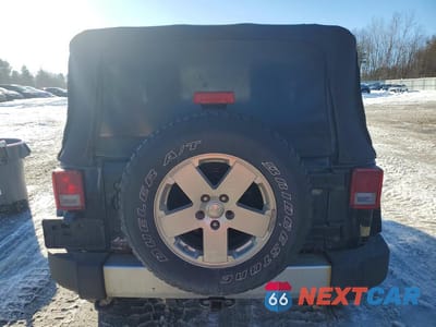 Zdjęcie 6 z 12 samochodu: 2010 JEEP WRANGLER SAHARA VIN:1J4AA5D19AL137210 - miniatura