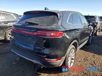 Trzecie zdjęcie samochodu z tyłu: 2018 LINCOLN MKC SELECT VIN:5LMTJ2DHXJUL07698 - miniatura