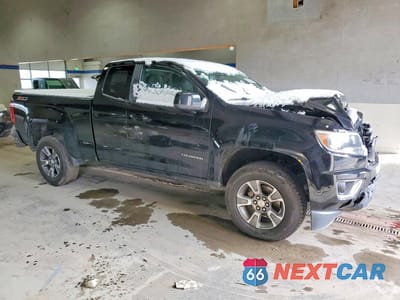 Czwarte zdjęcie samochodu z boku: 2015 CHEVROLET COLORADO Z71 VIN:1GCHTCE31F1137109 - miniatura