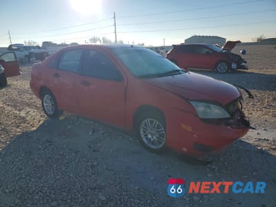 Czwarte zdjęcie samochodu z boku: 2007 FORD FOCUS VIN:1FAFP34N67W229731 - miniatura