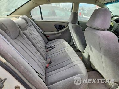 Zdjęcie 10 z 11 samochodu: 2003 CHEVROLET MALIBU VIN:1G1ND52JX3M673915 - miniatura
