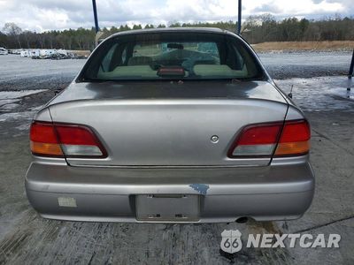 Zdjęcie 6 z 11 samochodu: 1996 NISSAN MAXIMA GLE VIN:JN1CA21D2XT206777 - miniatura